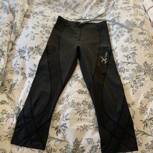 Black CWX compression running capris.
